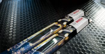 Bosch Envision wiper blades sitting on top of a parts counter.