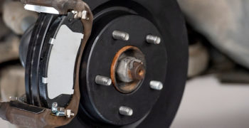 new duralast rotor and duralast brake pads installed on car